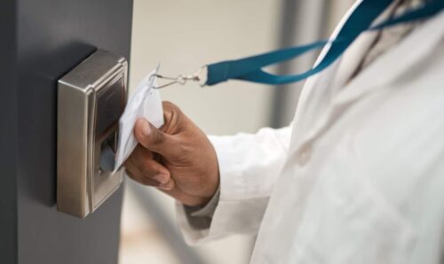 employee using door access system to get into building