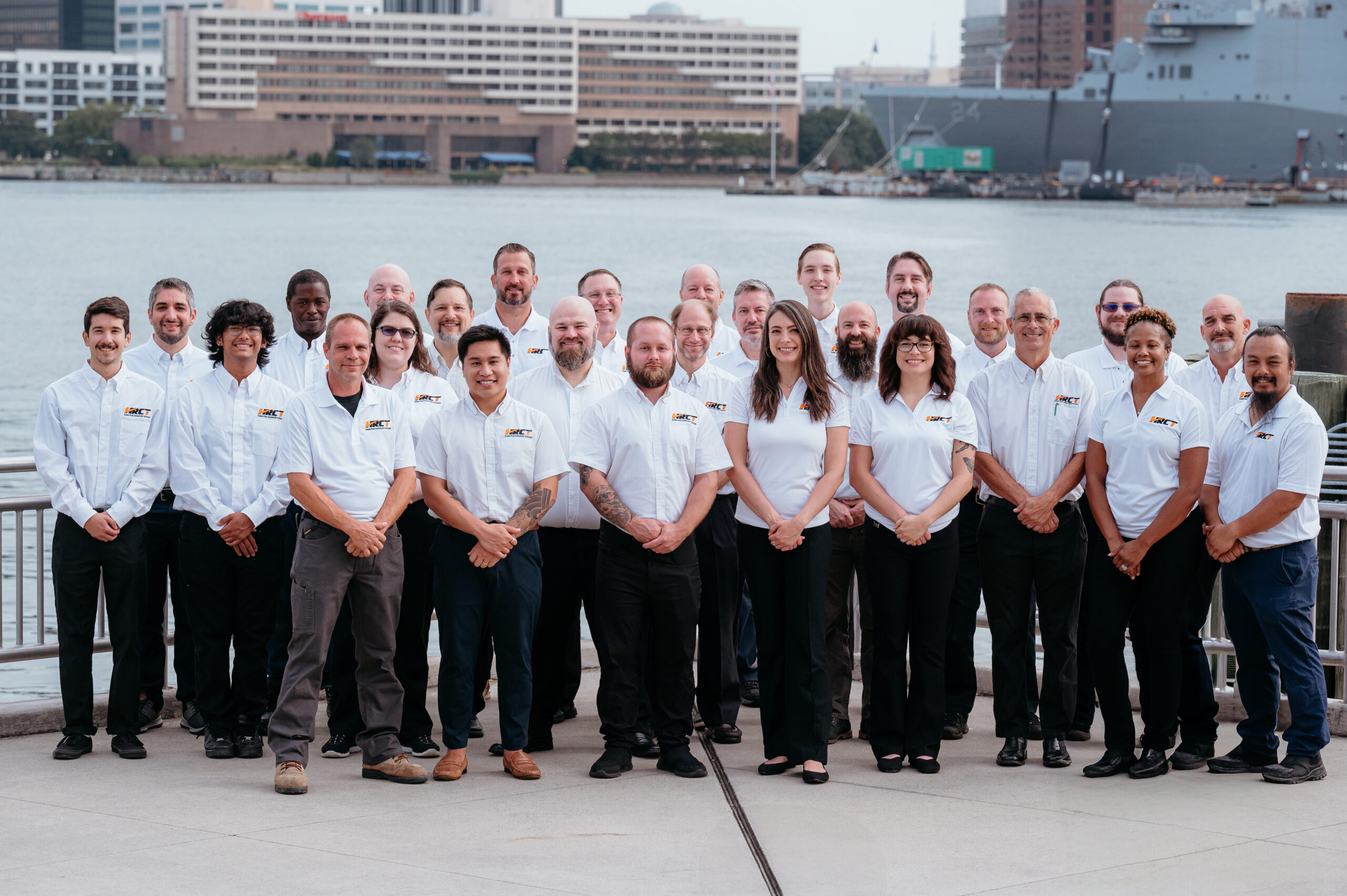 HRCT IT specialists team in front of lake